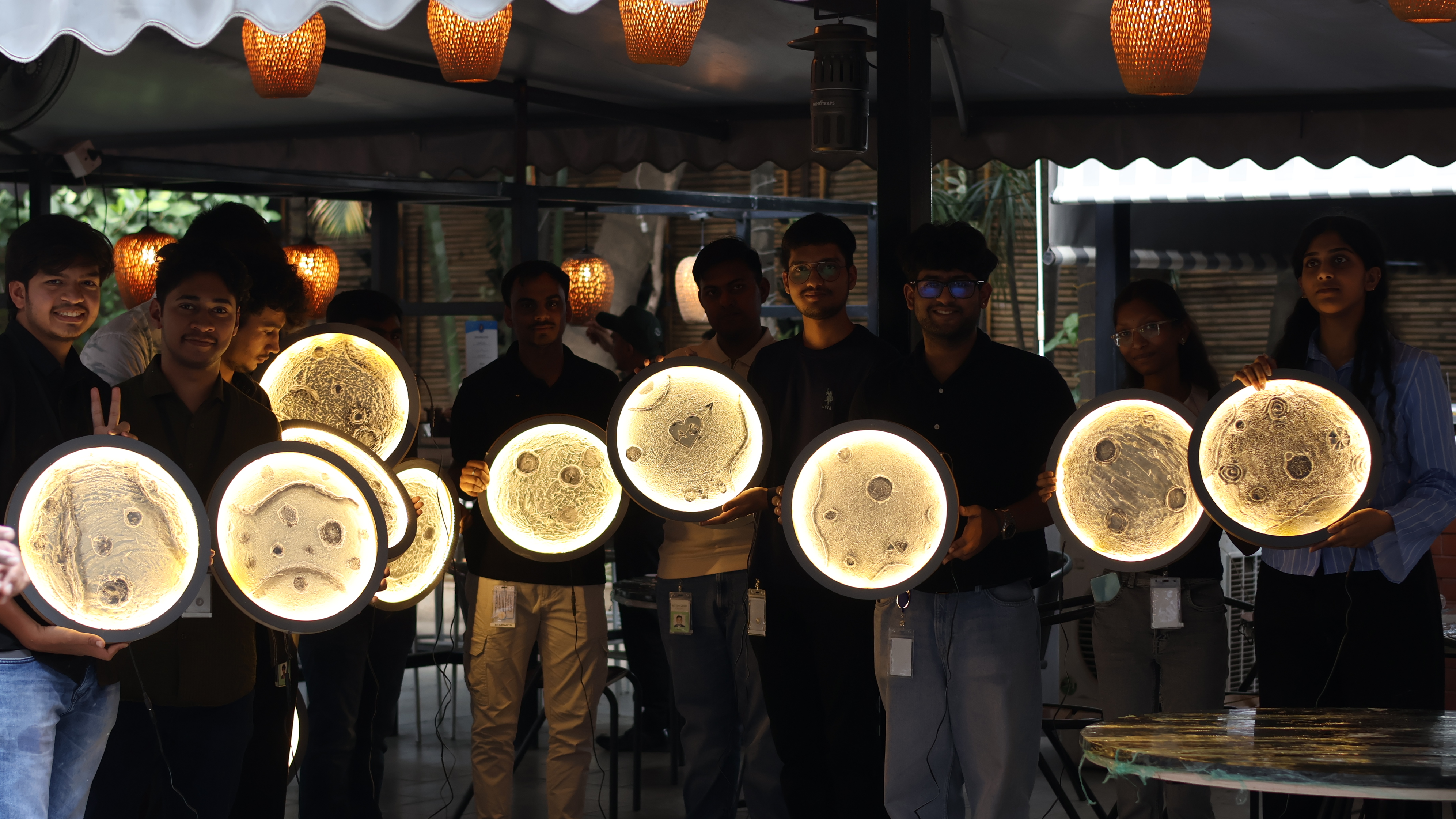 Workshop attendees with their creations